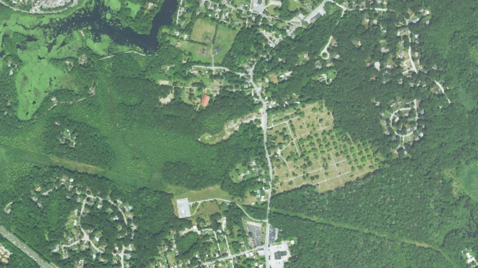 Aerial view of homes, roads and woods in North Kingstown, RI