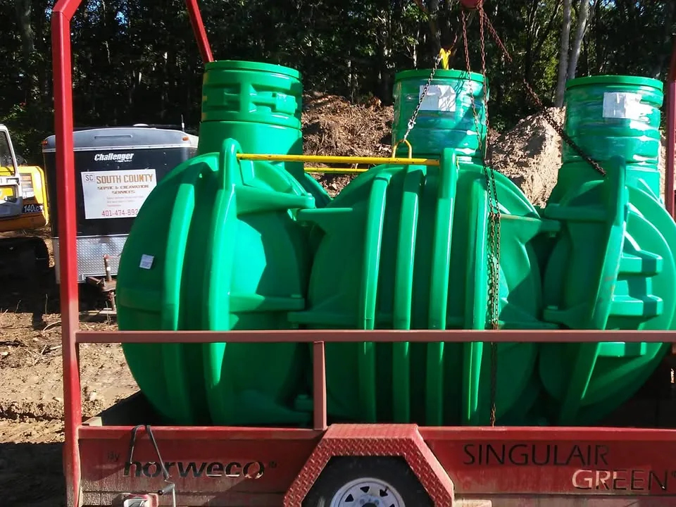 New green treatment tanks for an advanced system on a delivery trailer, septic system design